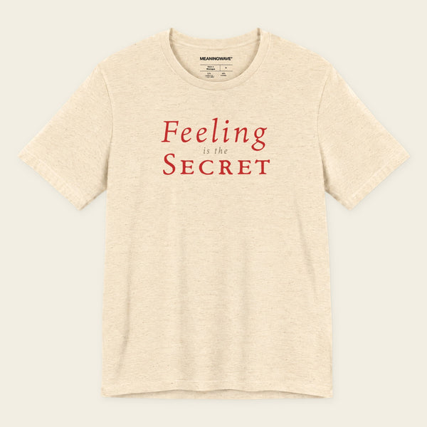 FEELING IS THE SECRET with Neville Goddard T-Shirt in Heather Natural, front