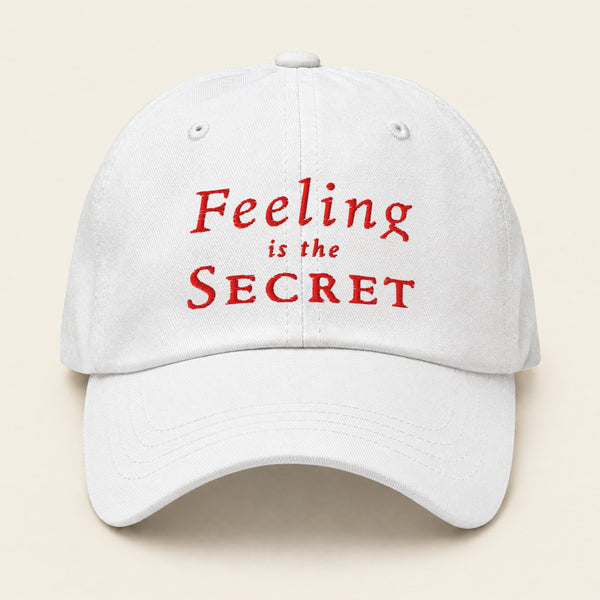 FEELING IS THE SECRET with Neville Goddard Dad Cap in White, front