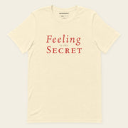 FEELING IS THE SECRET with Neville Goddard T-Shirt in Natural, front