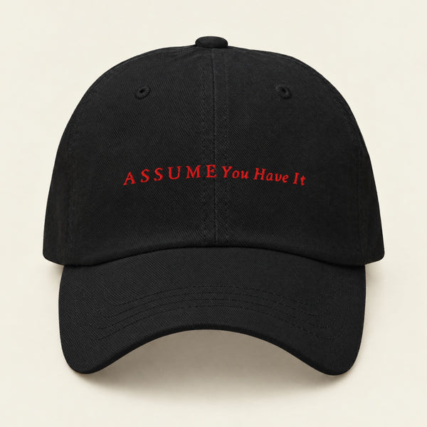ASSUME YOU HAVE IT with Neville Goddard Dad Cap in Black, front