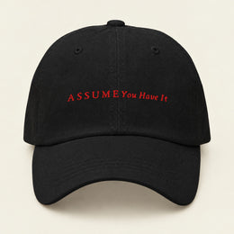 ASSUME YOU HAVE IT with Neville Goddard Dad Cap in Black, front